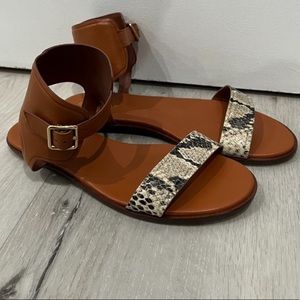 Cole Haan tan and snake print flat sandals